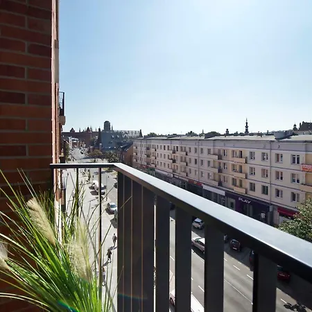 Chic Designer With Original Art And Old Town View